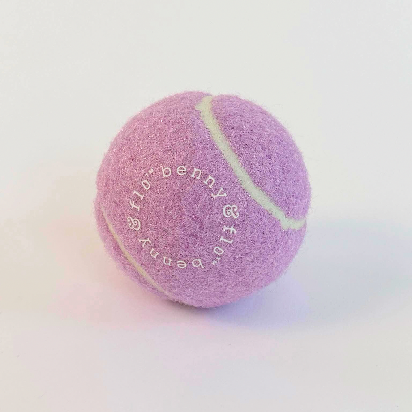 lilac purple dog tennis ball holder on white background