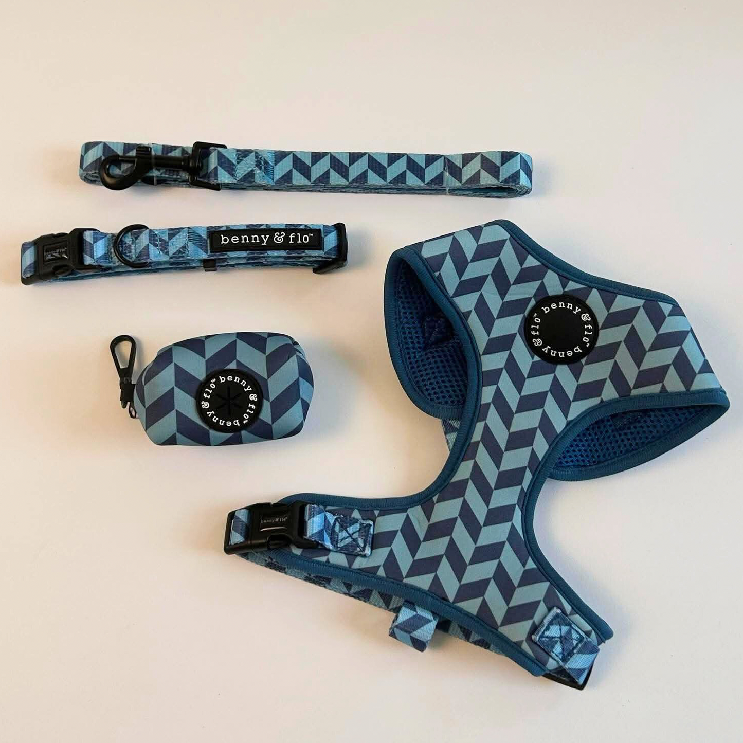 Blue Dog collar, leash, and harness set with geometric pattern on a light background