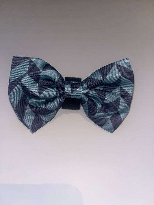 Blue geometric dog bow tie on a white background