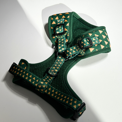 Green dog harness with cactus pattern on a white background
